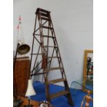 A VINTAGE PINE STEP LADDER.