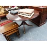 A MAHOGANY TILT TOP TABLE.