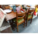 AN OAK REFECTORY STYLE DINING TABLE AND FOUR CHAIRS.