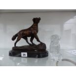 A BRONZED FIGURE OF A SPORTING DOG AND A WATERFORD GLASS DOG.