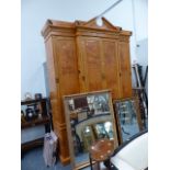 AN IMPRESSIVE BESPOKE MAPLE BOARDROOM CABINET OF BREAKFRONT FORM.