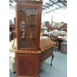 A WALNUT WRITING BUREAU AND A CORNER CABINET.