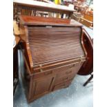 AN EDWARDIAN MAHOGANY INLAID ROLL TOP DESK.