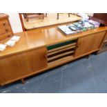 A RETRO OAK TAMBOUR FRONT SIDEBOARD.