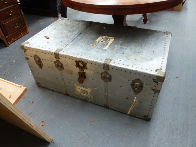 A LARGE ALLOY STORAGE TRUNK.