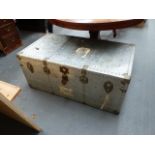 A LARGE ALLOY STORAGE TRUNK.