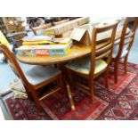 A PINE EXTENDING KITCHEN TABLE AND SIX CHAIRS.