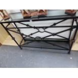 A WROUGHT IRON CONSOLE TABLE WITH MATCHING MIRROR OVER.