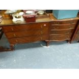 A SMALL SERPENTINE FRONT CHEST OF DRAWERS AND A THREE DRAWER CHEST.