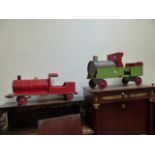 A VINTAGE WOODEN AND TIN SCRATCH BUILT MODEL TRAIN AND ANOTHER RED EXAMPLE.