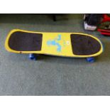 A TODDLER'S SKATE BOARD.