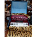 A VERY GOOD QUALITY PIANO ACCORDIAN IN VIRTUALLY UNUSED CONDITION, WITH CASE.