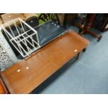 A WROUGHT IRON TELEPHONE TABLE AND A RETRO COFFEE TABLE.