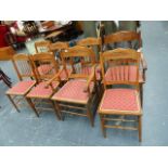 A SET OF LATE VICTORIAN SPINDLE BACK DINING CHAIRS.