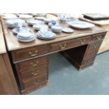 A MAHOGANY TWIN PEDESTAL DESK.