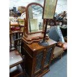 AN OAK STEREO CABINET, A SWING MIRROR , A POLE SCREEN AND A SUITCASE.