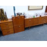 A RETRO TEAK AND ROSEWOOD SIDEBOARD, A MATCHING CABINET AND A SIMILAR FOUR DRAWER CHEST.