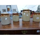 FOUR STORAGE JARS.