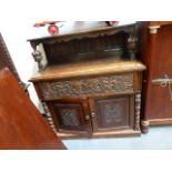 AN ANTIQUE AND LATER OAK SIDE CABINET.
