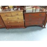 A VICTORIAN MAHOGANY CHEST OF DRAWERS AND AN EDWARDIAN THREE DRAWER CHEST.