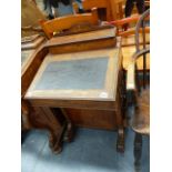 A VICTORIAN MAHOGANY AND INLAID DAVENPORT DESK.