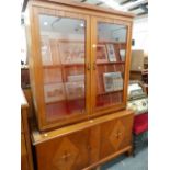 AN ART DECO OAK SIDE CABINET.