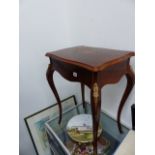 A VICTORIAN WALNUT SEWING TABLE.