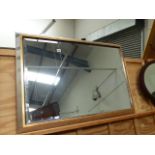 A GOOD QUALITY SILVERED FRAME WALL MIRROR.