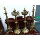TWO PAIRS OF BRASS LAMPS.