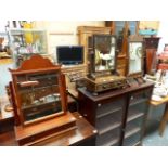 THREE SWING MIRRORS AND AN OAK OCCASIONAL TABLE.