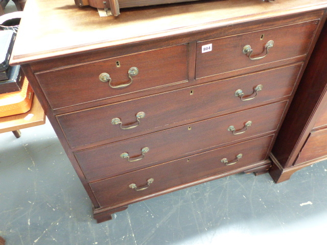 A GEORGIAN MAHOGANY CHEST OF TWO SHORT AND THREE LONG DRAWERS.