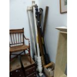 A QTY OF CURTAIN POLES,ETC.
