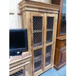 A HARDWOOD BOOKCASE CABINET.