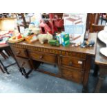 AN OAK DRESSING TABLE.