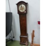 A WALNUT CASED GRANDMOTHER CLOCK.