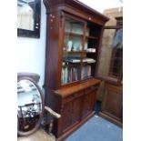 A LATE VICTORIAN BOOKCASE CABINET.