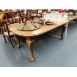 AN EARLY 20th.C.OAK DINING TABLE.