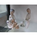 TWO LLADRO AND NAO FIGURINES.