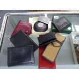 A SELECTION OF LEATHER WALLETS, CARD CASES, ETC TO INCLUDE CONCORD AND HOLLAND AND HOLLAND.