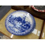 A SET OF FOUR DELFT STYLE PLATES.