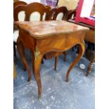 A CONTINENTAL BRASS MOUNTED LIFT TOP DRESSING TABLE.