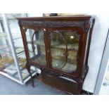 AN EDWARDIAN DISPLAY CABINET.