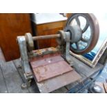 A VINTAGE LEATHER EMBOSSING PRESS.