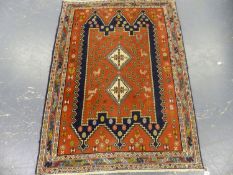 A PERSIAN RUG OF CAUCASIAN DESIGN. 148 x 112cms.