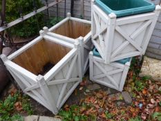 TWO PAIRS OF PAINTED PINE TERRACE PLANTERS.