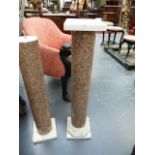 A PAIR OF PINK GRANITE AND MARBLE COLUMNS. H.106cms.