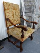 A PAIR OF CARVED WALNUT CONTINENTAL BAROQUE STYLE HIGH BACK ARMCHAIRS COVERED WITH FIGURAL AND