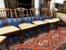 AN UNUSUAL SET OF SIX PROVINCIAL COUNTRY DINING CHAIRS WITH PIERCED SPLAT BACKS AND CREST RAIL, DROP