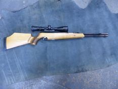 AIR RIFLE. AIR ARMS T x 200 UNDER LEVER .177 FITTED WITH BSA VARIABLE SCOPE, COMPLETE WITH CARRY