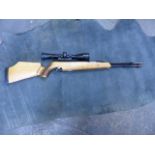 AIR RIFLE. AIR ARMS T x 200 UNDER LEVER .177 FITTED WITH BSA VARIABLE SCOPE, COMPLETE WITH CARRY